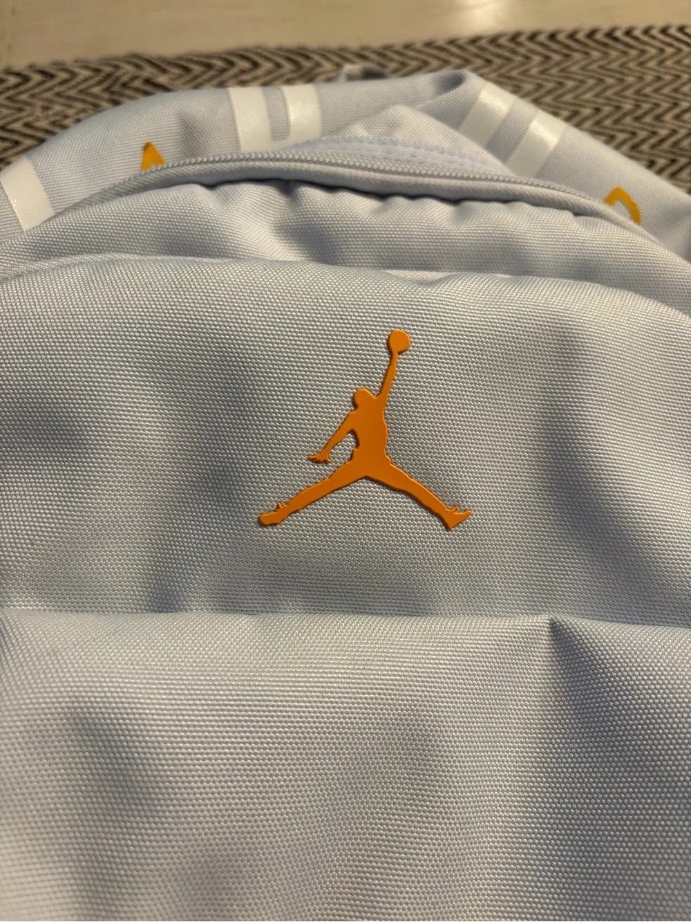 Jordan Light Gray Backpack with Orange Accents